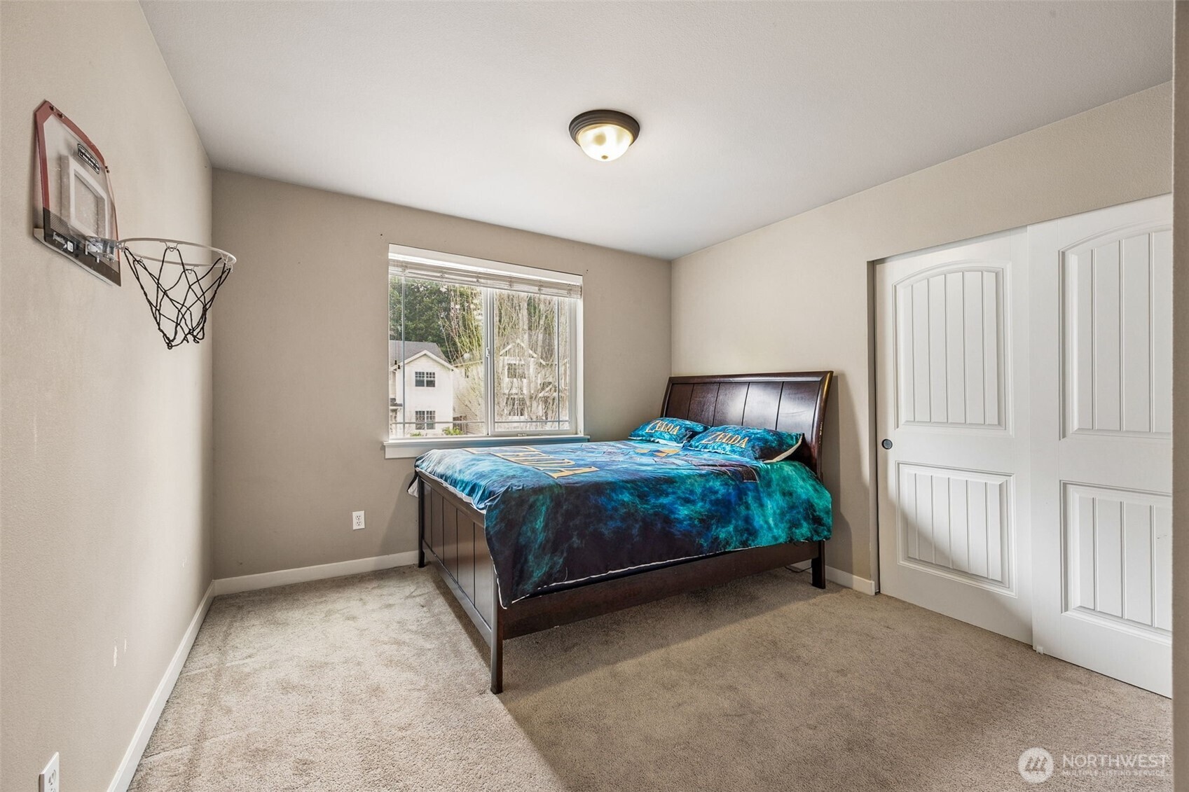 20522 95th Ave Court East Graham, WA 98338 - Photo 18 of 29 a bedroom with a bed and a window