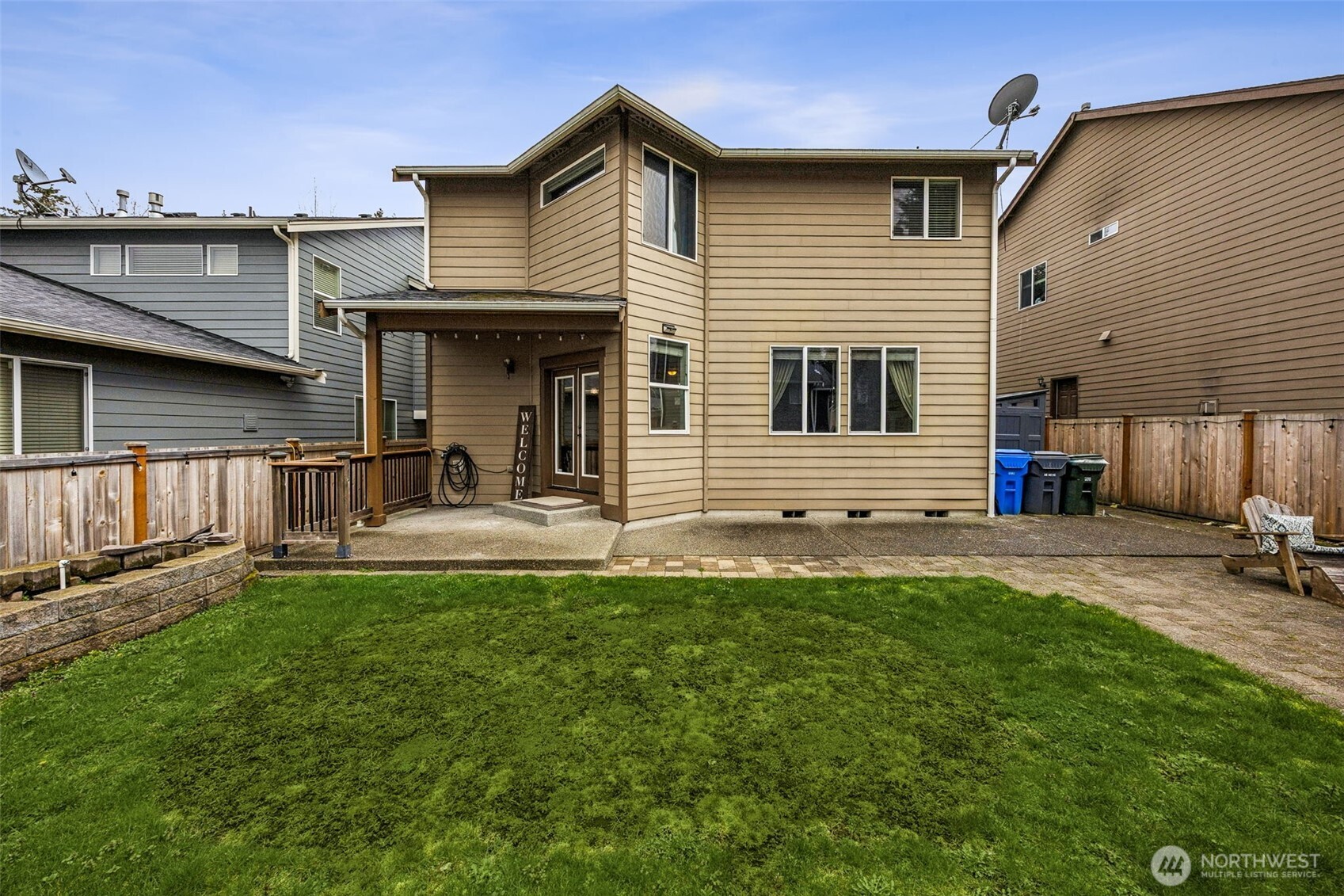 20522 95th Ave Court East Graham, WA 98338 - Photo 25 of 29 a front view of a house with a yard