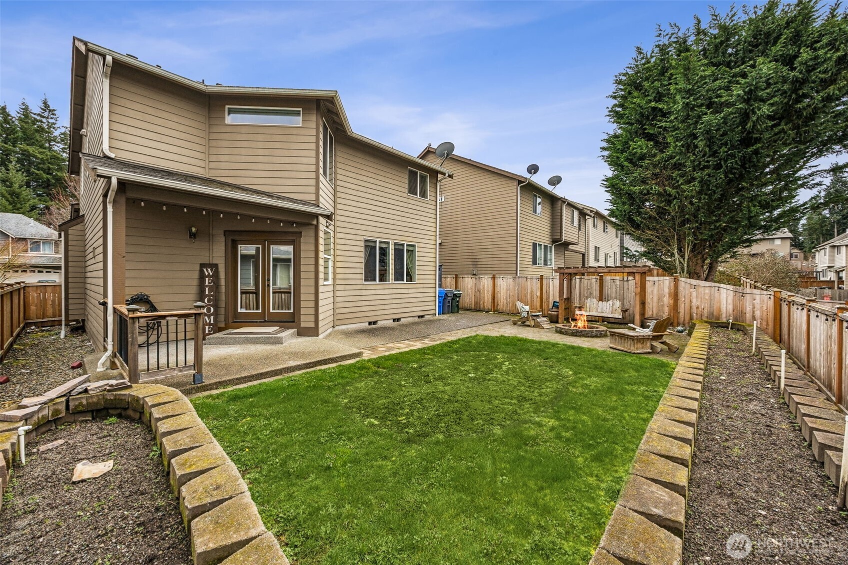 20522 95th Ave Court East Graham, WA 98338 - Photo 26 of 29 a view of a house with backyard and sitting area