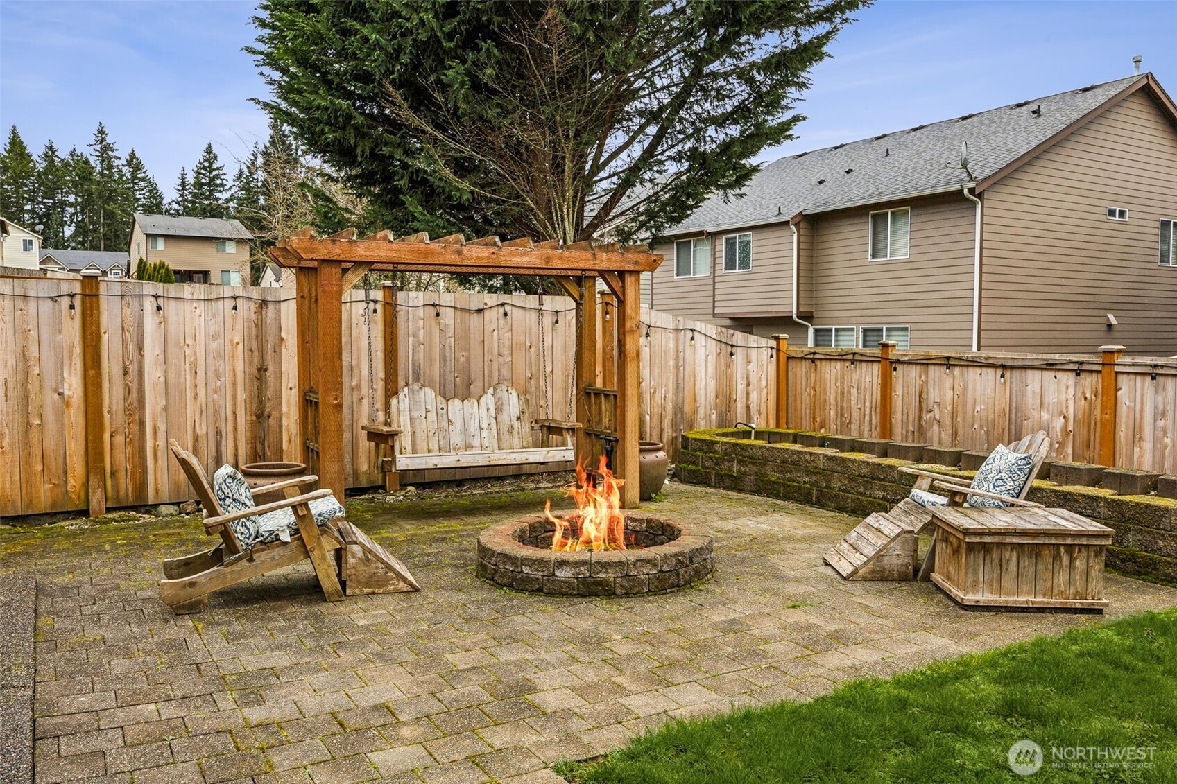20522 95th Ave Court East Graham, WA 98338 - Photo 27 of 29 a view of a patio with a table and chairs
