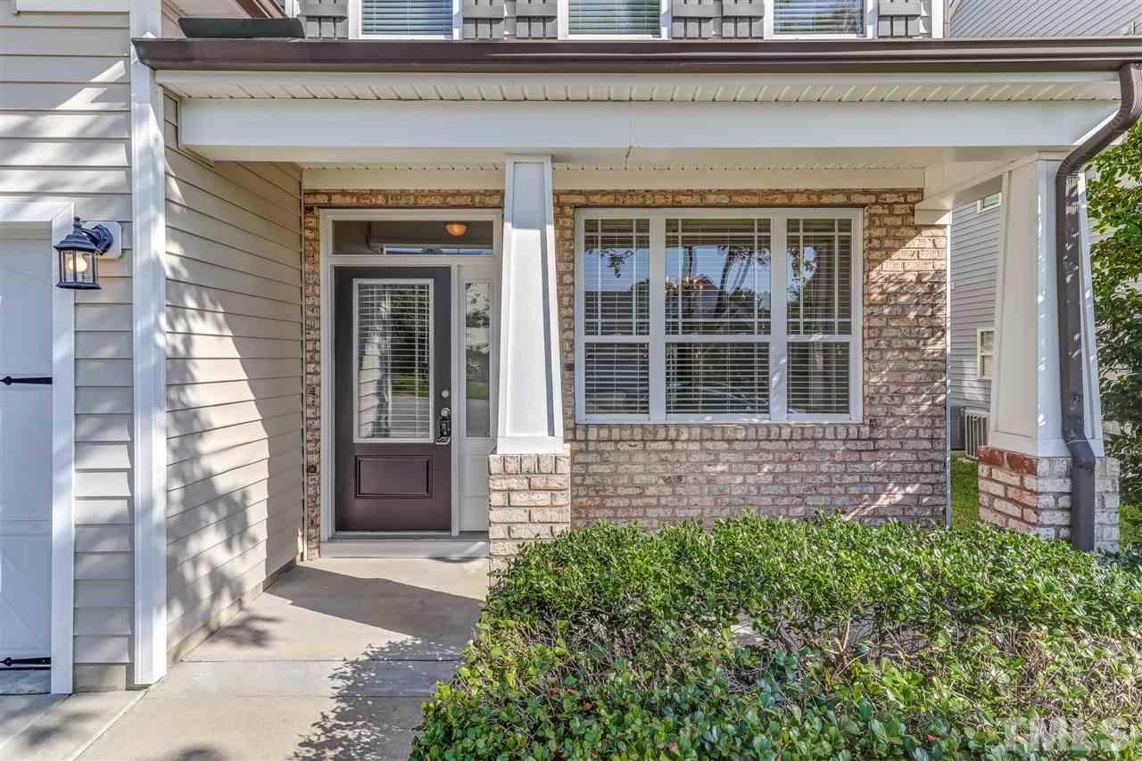 4143 White Kestrel Drive Raleigh, NC 27616 - Photo 2 of 30 a front view of a house with a yard