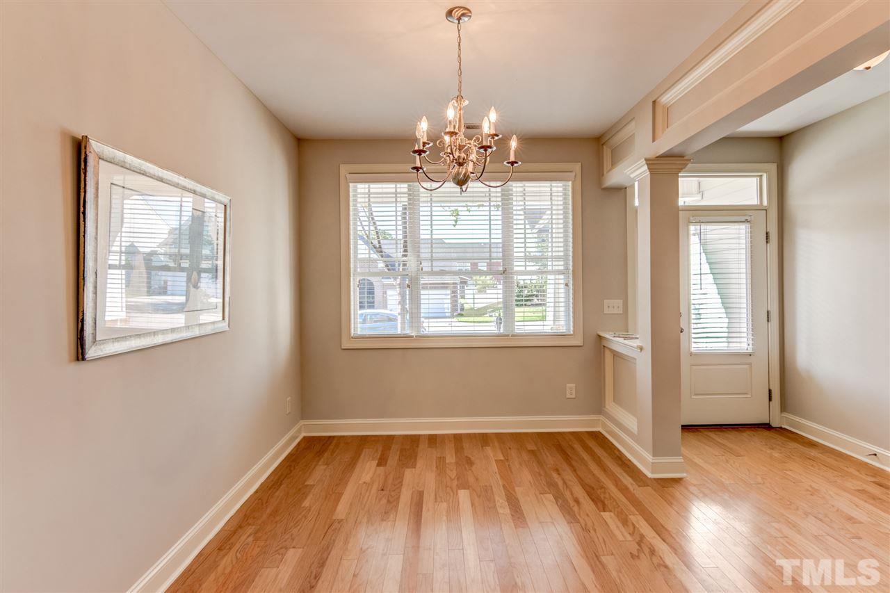 4143 White Kestrel Drive Raleigh, NC 27616 - Photo 3 of 30 a view of empty room with wooden floor and fan
