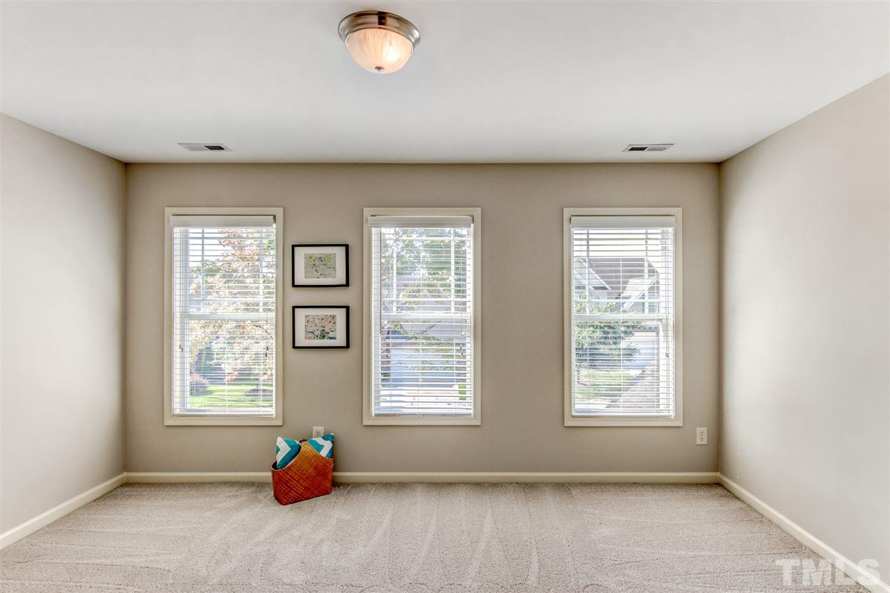 4143 White Kestrel Drive Raleigh, NC 27616 - Photo 21 of 30 a living room with furniture and window