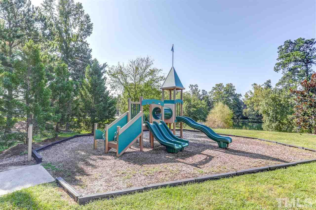 4143 White Kestrel Drive Raleigh, NC 27616 - Photo 27 of 30 a view of a park with a slide