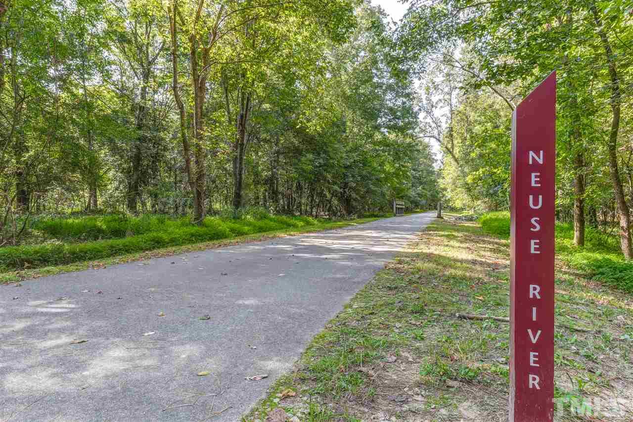4143 White Kestrel Drive Raleigh, NC 27616 - Photo 29 of 30 a view of a yard with plants and trees