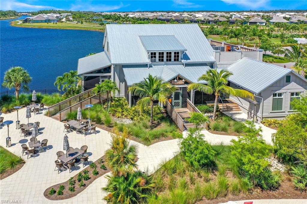 6875 Saona Court Naples, FL 34113 - Photo 18 of 21 a picture of houses with outdoor space