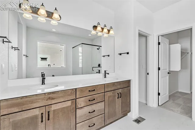 a view of an empty walk in closet