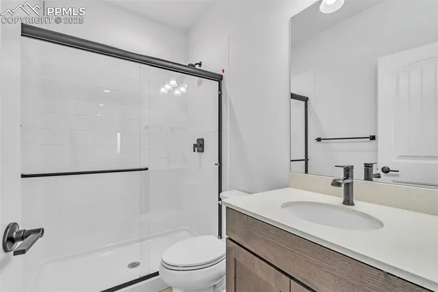 a view of cabinets and wooden floor