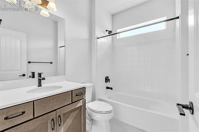 a bathroom with a sink a toilet and a bathtub