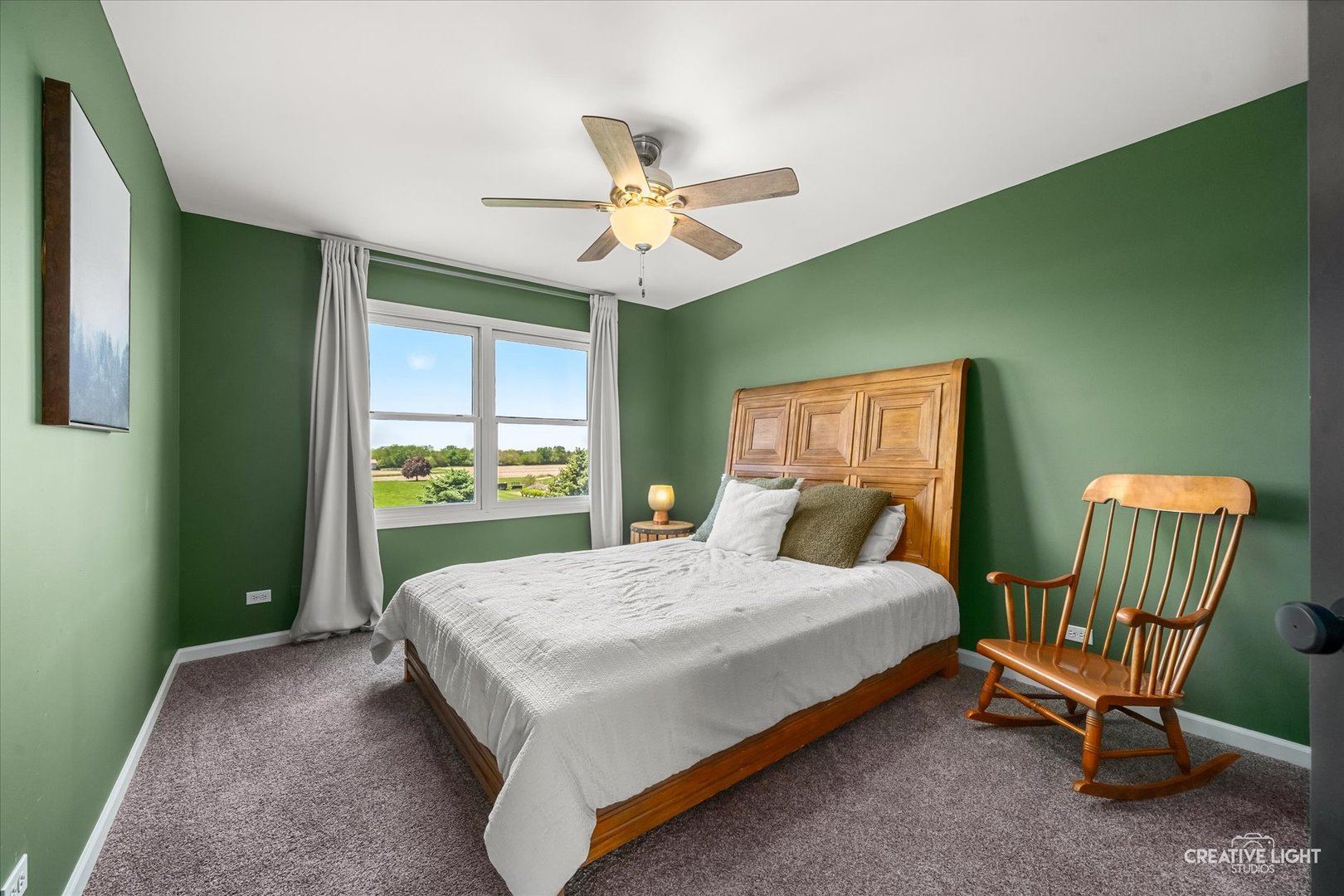 13495 Fennel Road Newark, IL 60541 - Photo 23 of 43 a bed sitting in a room next to a window
