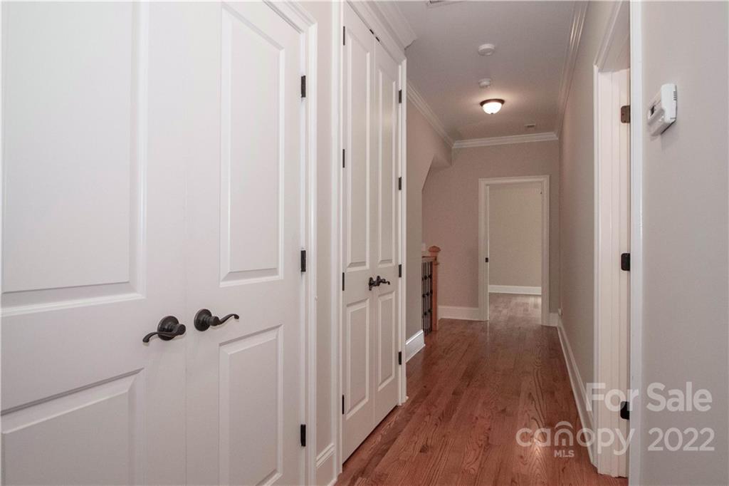 333 Spring Street Davidson, NC 28036 - Photo 20 of 44 a view of a room with wooden floor