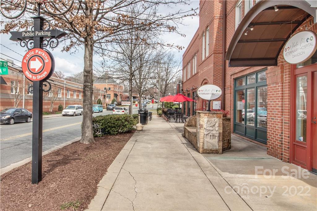 333 Spring Street Davidson, NC 28036 - Photo 42 of 44 a view of a pathway along the side of a building