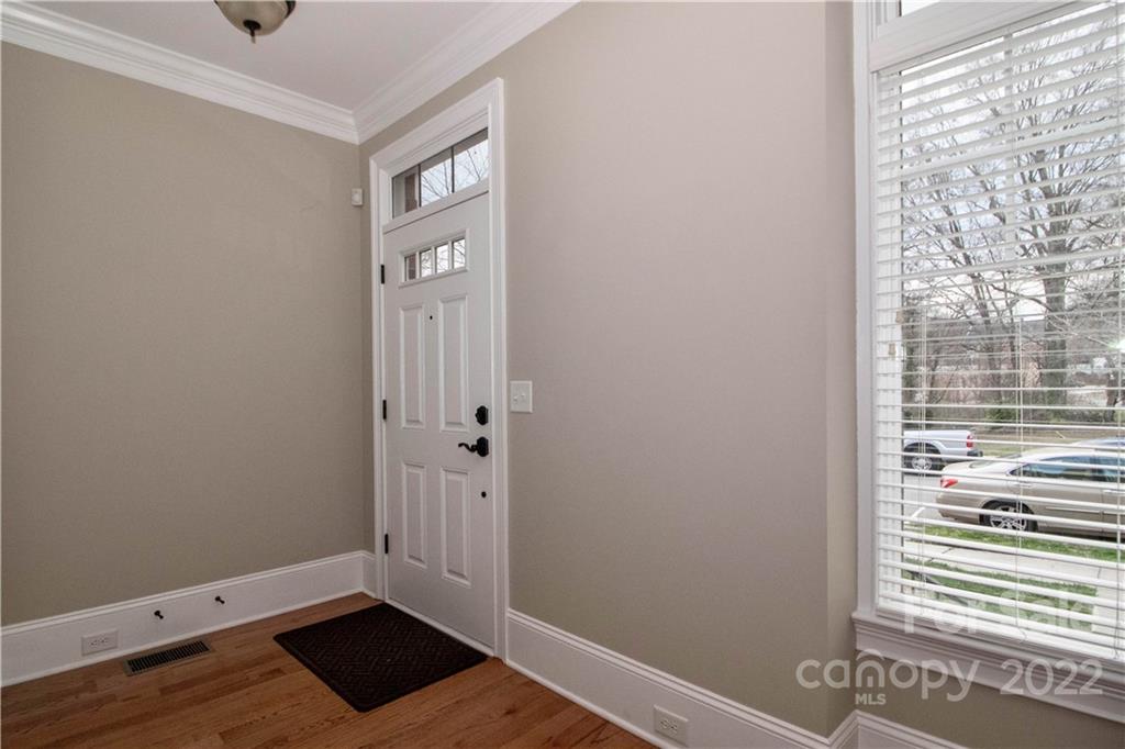 333 Spring Street Davidson, NC 28036 - Photo 5 of 44 a view of an empty room and window
