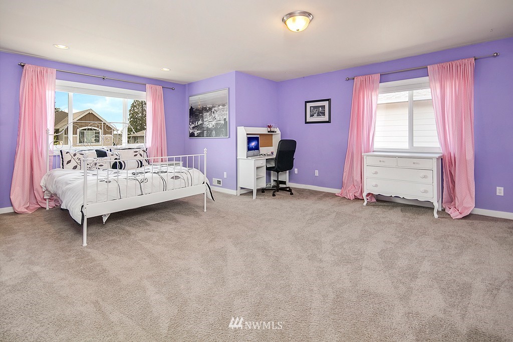 3815 222nd Place Southeast Bothell, WA 98021 - Photo 13 of 20 a bed room with a bed and a chair