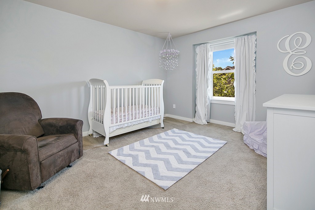 3815 222nd Place Southeast Bothell, WA 98021 - Photo 14 of 20 a living room with furniture and a window