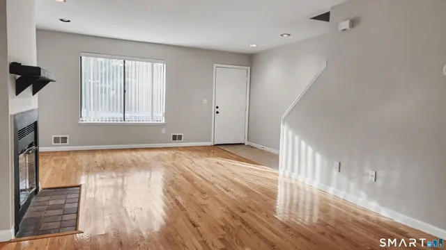 a bathroom with a sink toilet and mirror