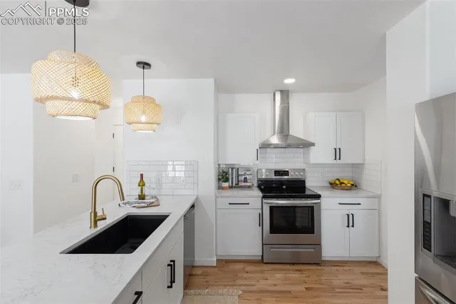 a very nice looking dining room with a table and chairs