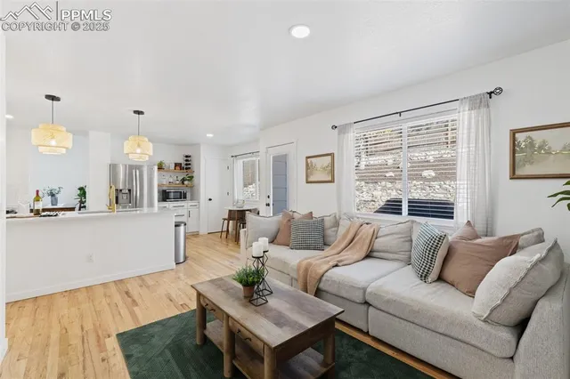 a bathroom with a toilet a sink and a mirror