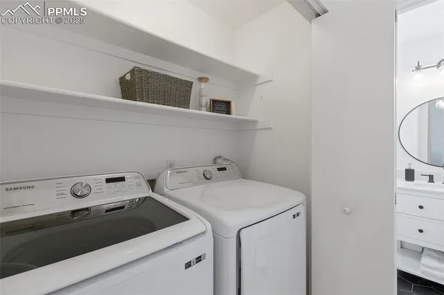 a bed room with a bed and a chandelier