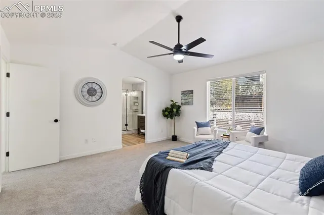 a bathroom with a double vanity sink mirror and shower