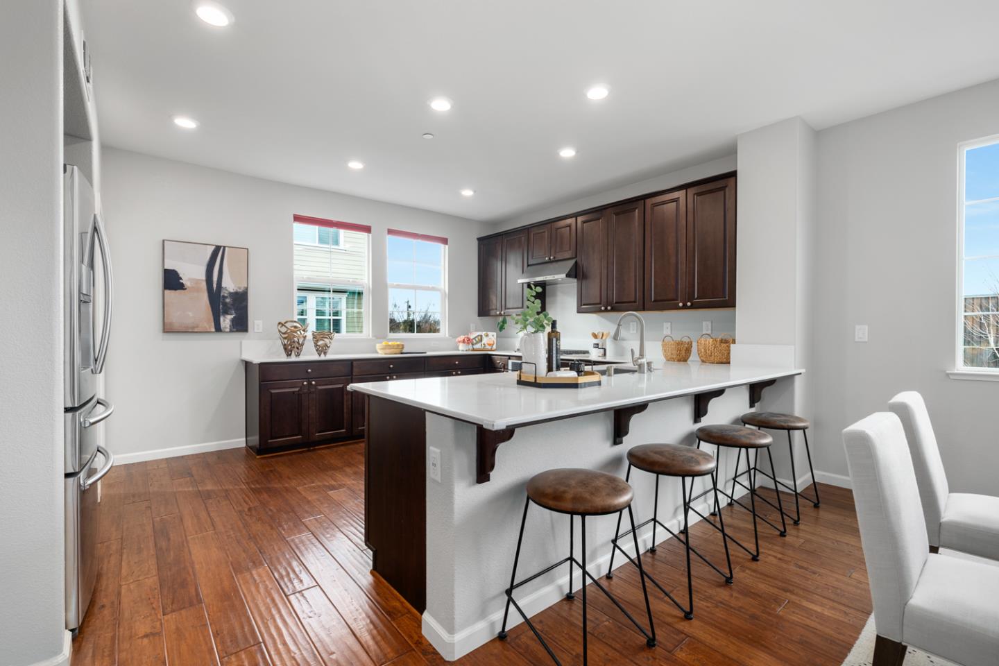 2208 Rosenblatt Street Hayward, CA 94544 - Photo 13 of 32 a kitchen with a sink cabinets and wooden floor
