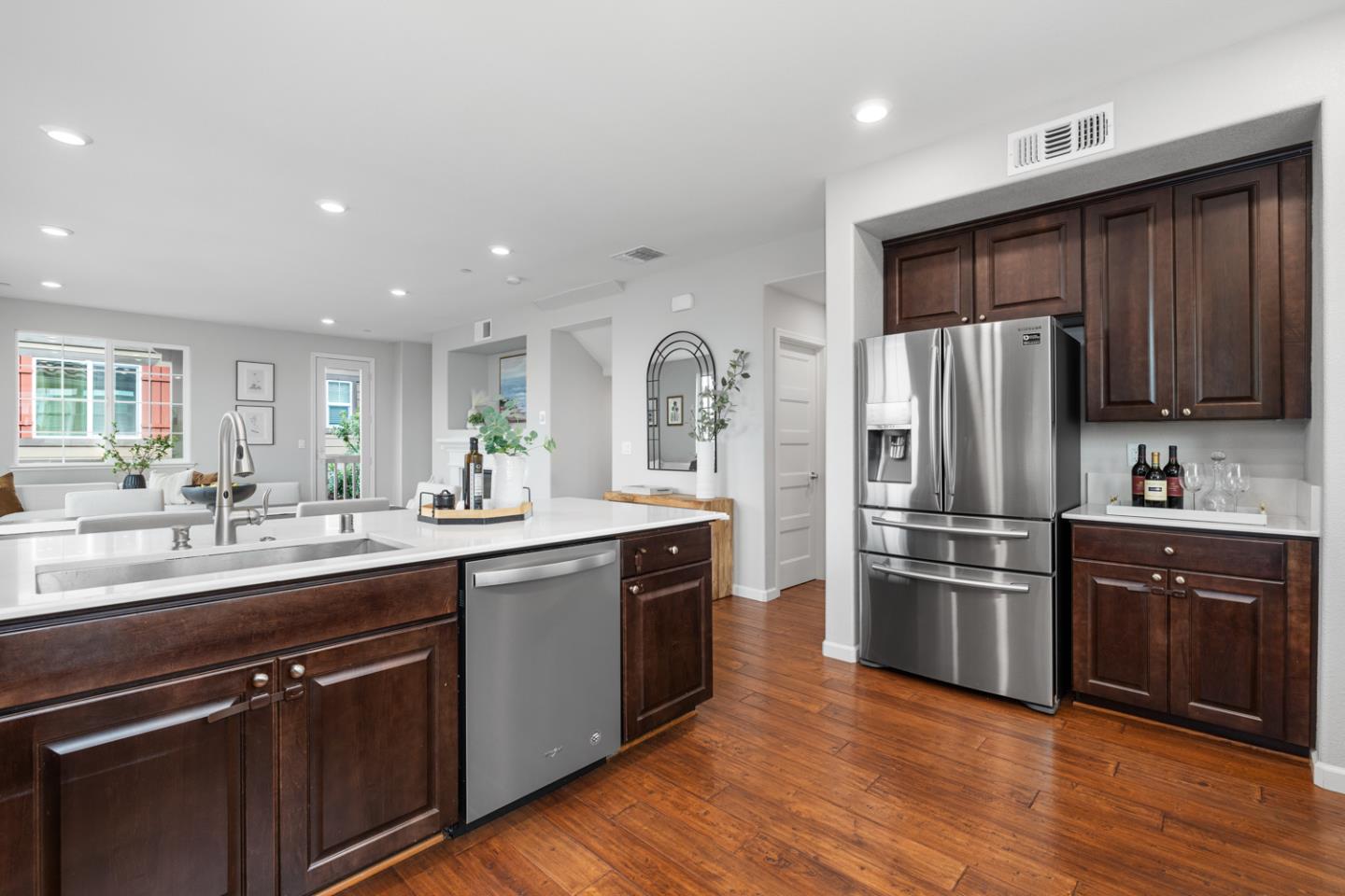 2208 Rosenblatt Street Hayward, CA 94544 - Photo 16 of 32 a kitchen with kitchen island granite countertop stainless steel appliances and wooden cabinets