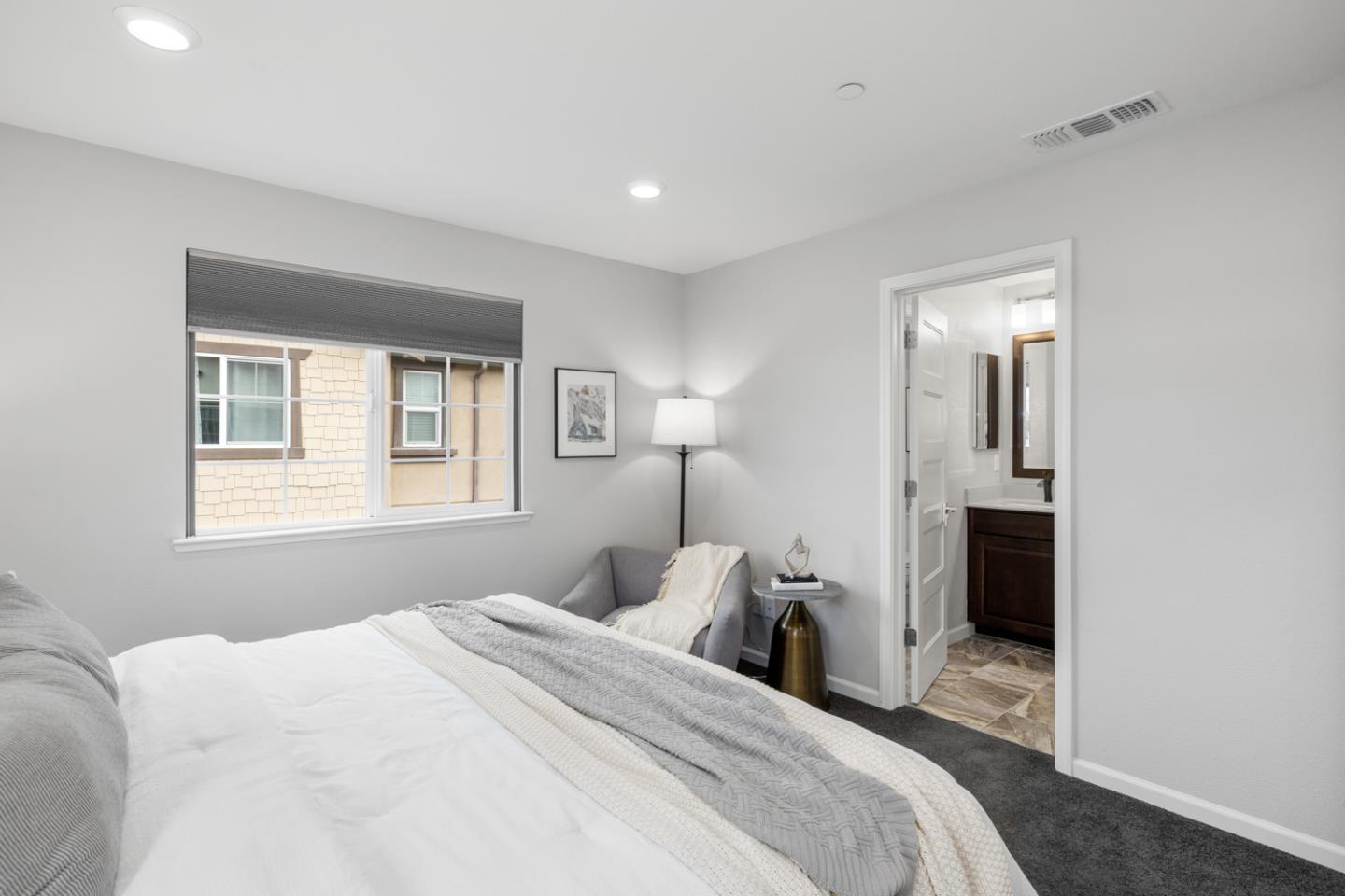 2208 Rosenblatt Street Hayward, CA 94544 - Photo 20 of 32 a bedroom with a bed and a window