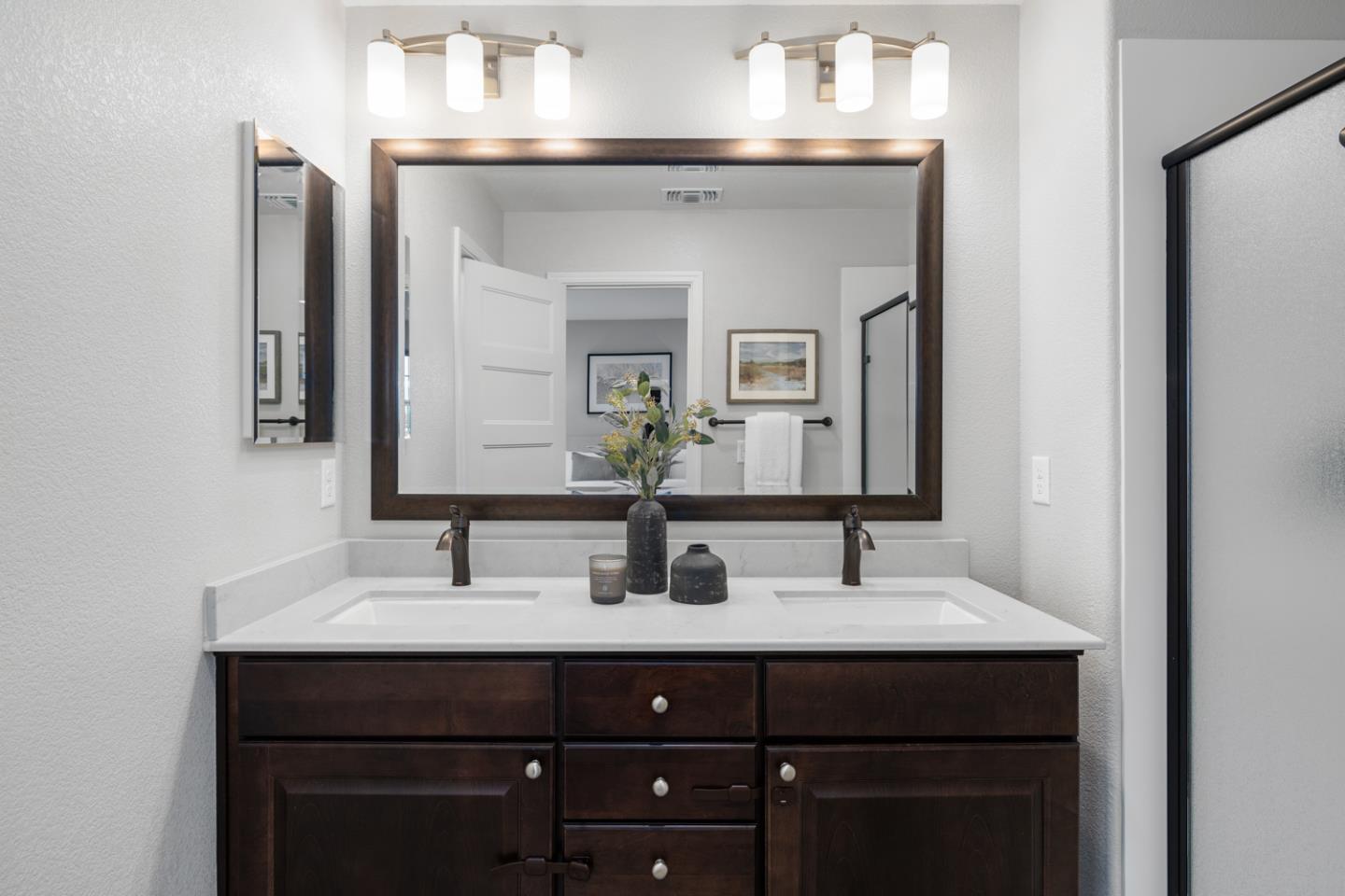 2208 Rosenblatt Street Hayward, CA 94544 - Photo 21 of 32 a bathroom with a sink and a mirror