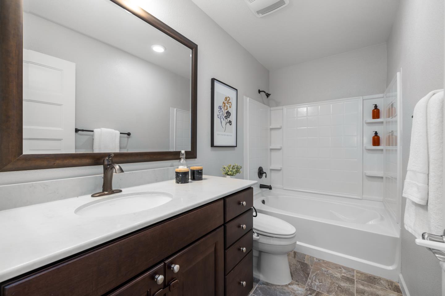 2208 Rosenblatt Street Hayward, CA 94544 - Photo 27 of 32 a bathroom with a sink a toilet and shower