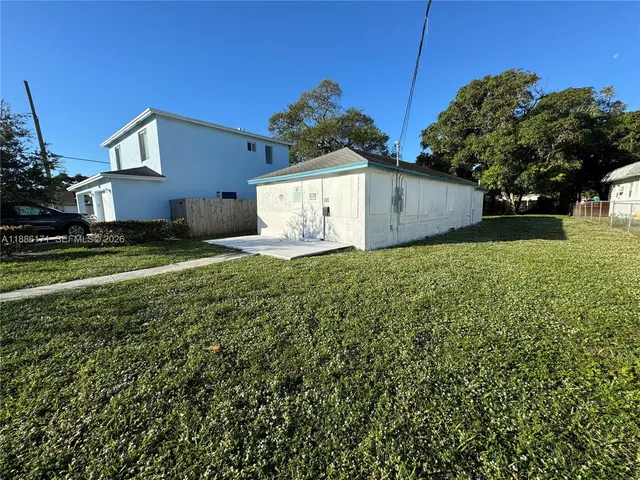 a house view with a garden space