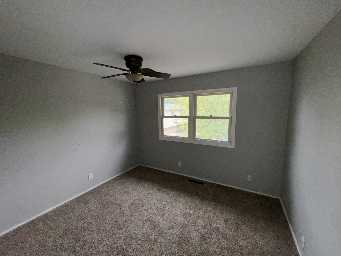 1612 Golfview Road Rantoul, IL 61866 - Photo 33 of 46 a view of an empty room with a window