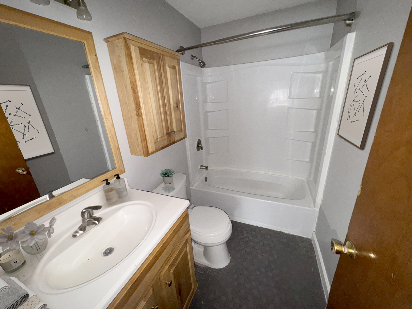 1612 Golfview Road Rantoul, IL 61866 - Photo 37 of 46 a bathroom with a bathtub shower sink vanity and a toilet