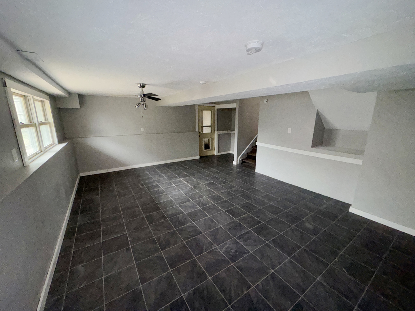 1612 Golfview Road Rantoul, IL 61866 - Photo 42 of 46 a view of an empty room with a window