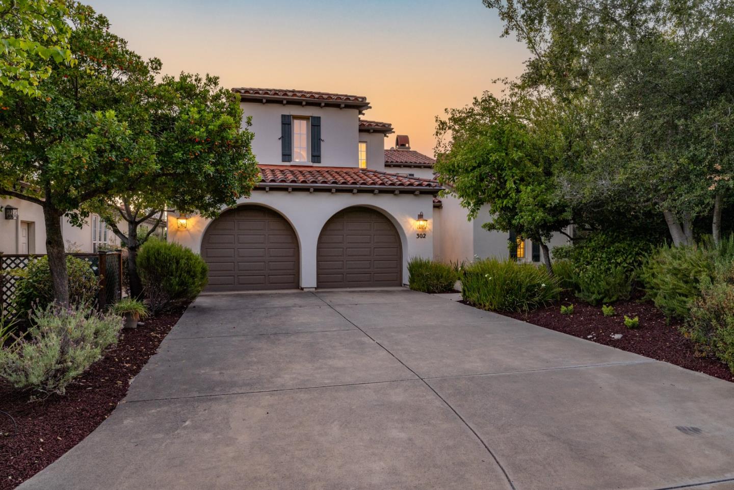 302 Pasadera Drive Monterey, CA 93940 - Photo 32 of 40 a front view of a house with plants and trees