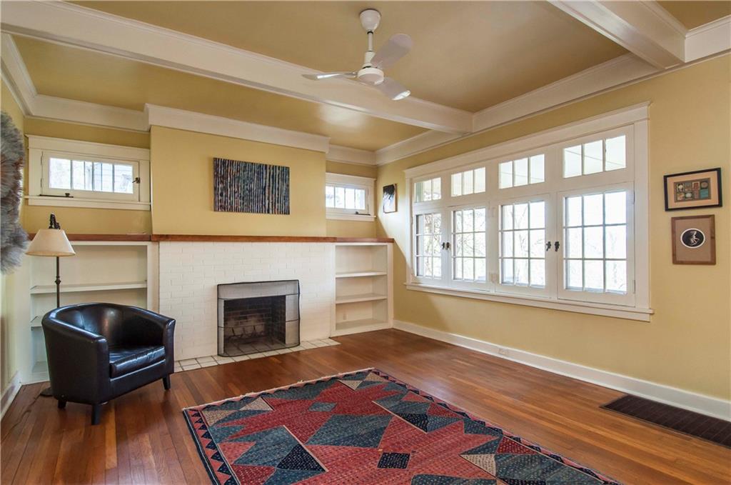 235 Woodside Road Forest Hills, PA 15221 - Photo 4 of 22 Large Living Room with Hardwood Floors and Fireplace.