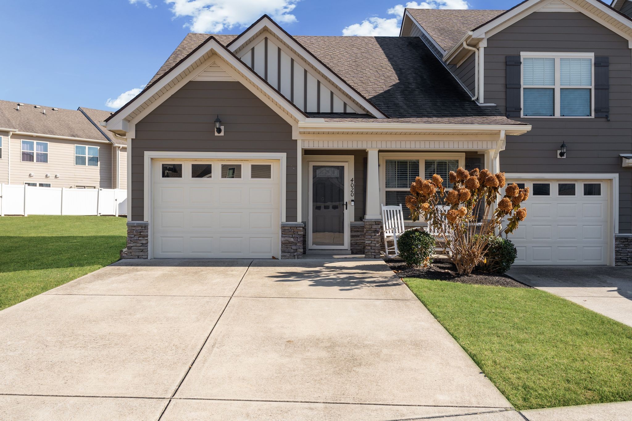 front view of a house with a yard