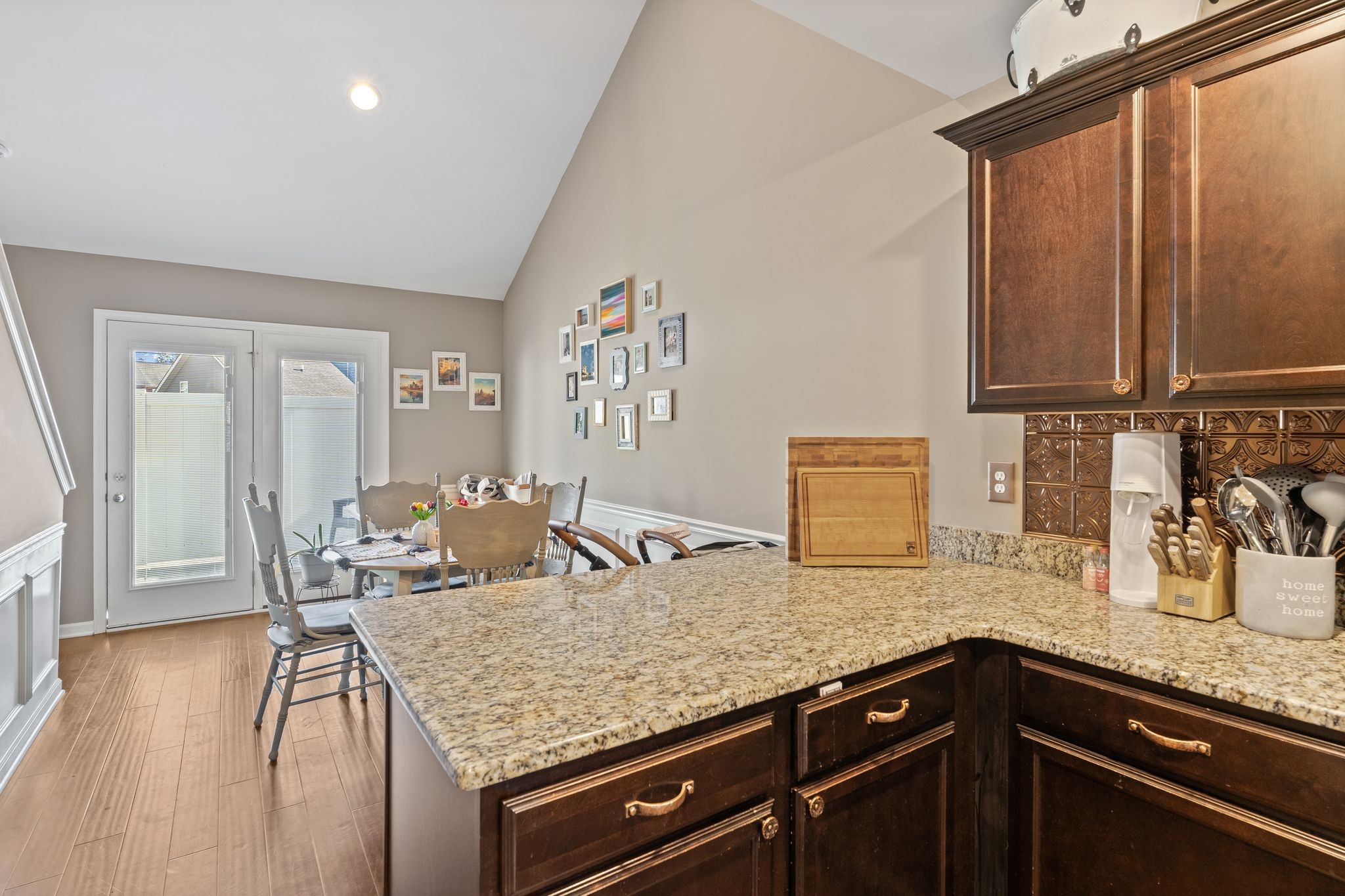 4020 Commons Drive Spring Hill, TN 37174 - Photo 11 of 37 a kitchen with granite countertop a sink and cabinets