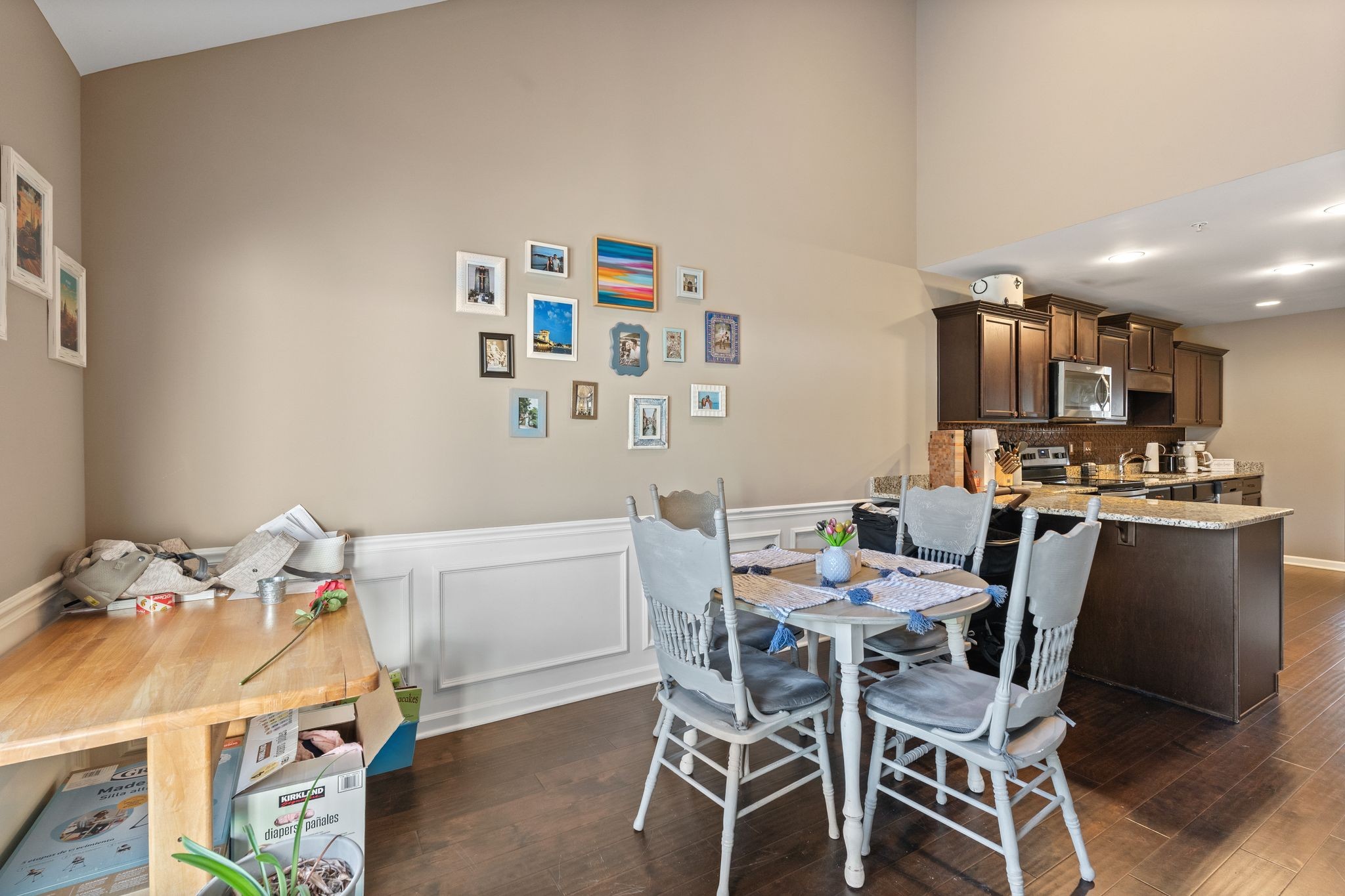 4020 Commons Drive Spring Hill, TN 37174 - Photo 12 of 37 a view of a dining room with furniture and chandelier