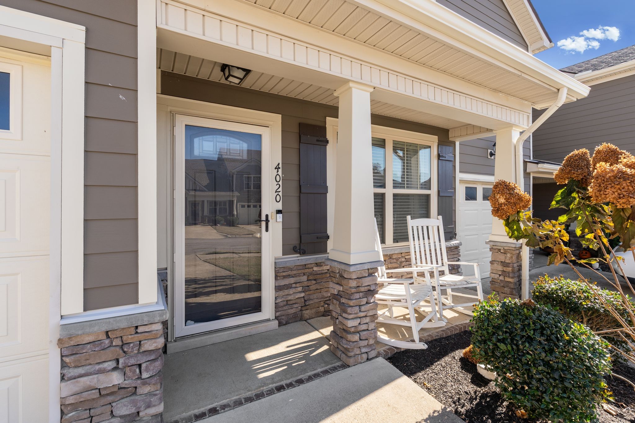 4020 Commons Drive Spring Hill, TN 37174 - Photo 3 of 37 a front view of a house with a porch