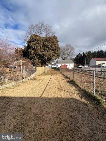 a kitchen with granite countertop cabinets and a sink