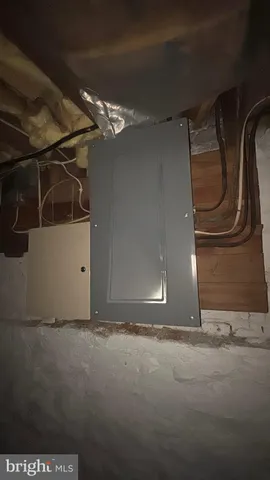 a bathroom with a sink toilet and window