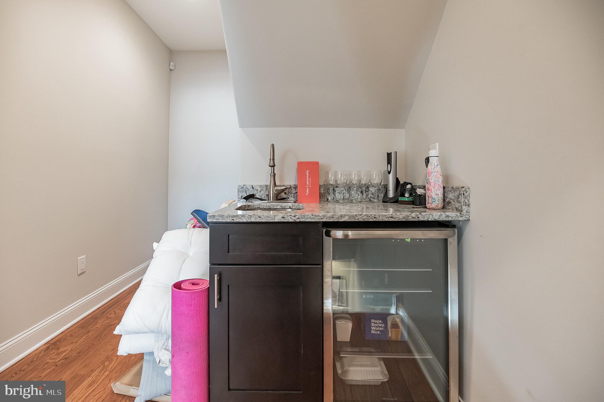425 Mercy Street Philadelphia, PA 19148 - Photo 28 of 38 Wet bar at the rooftop deck entrance