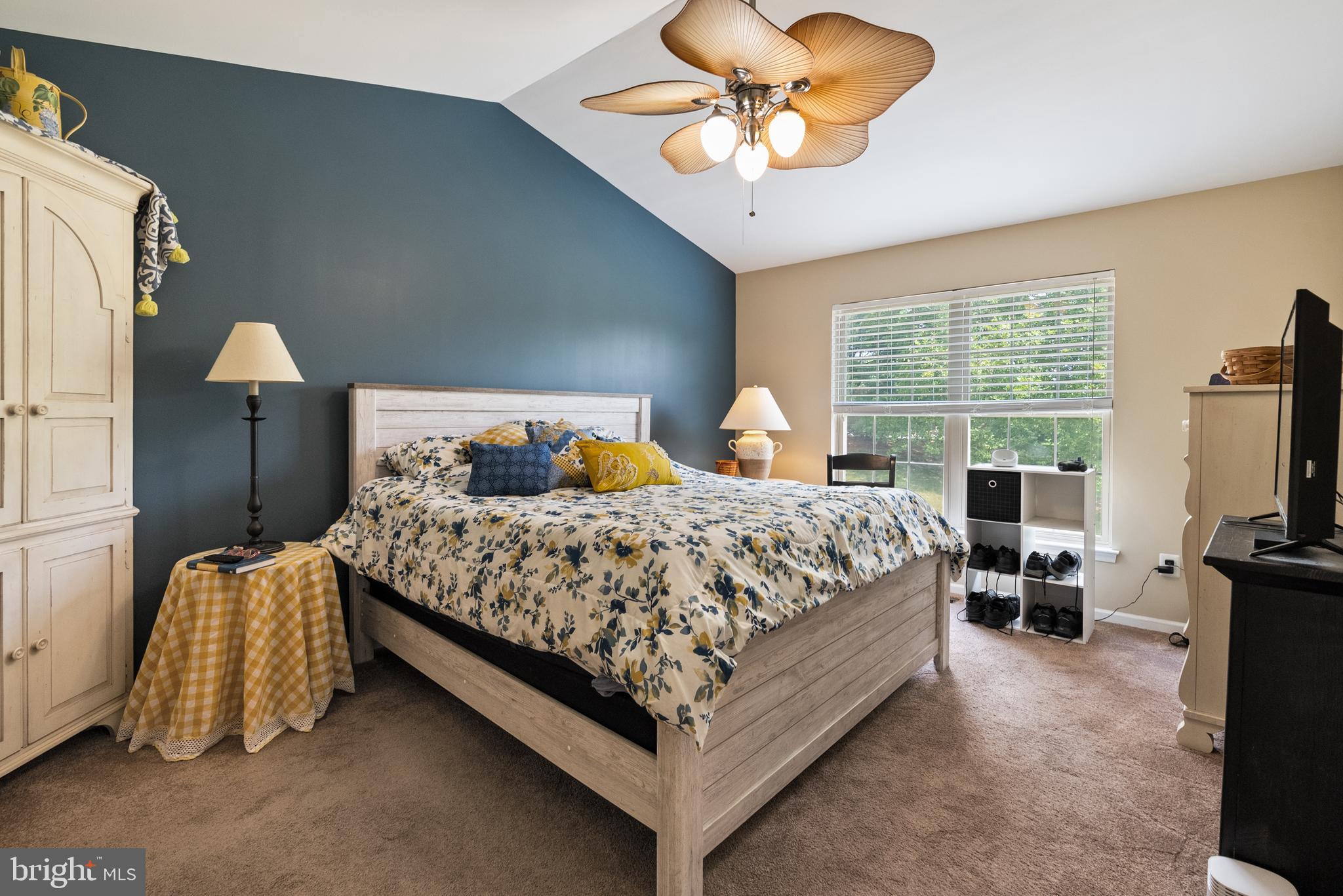 5 Chadwick Circle Eagleville, PA 19403 - Photo 13 of 32 a bedroom with a bed flat screen tv and a large window