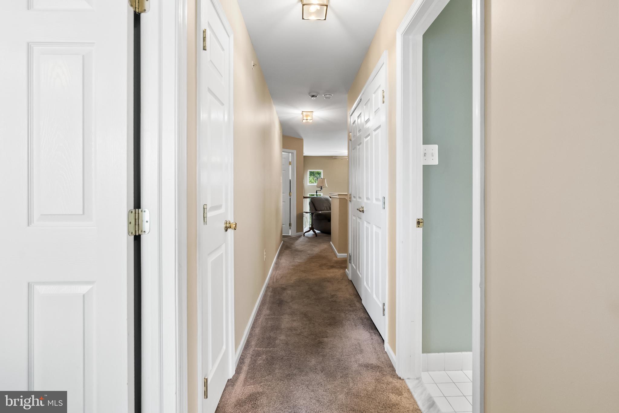 5 Chadwick Circle Eagleville, PA 19403 - Photo 21 of 32 a view of a hallway with wooden floor