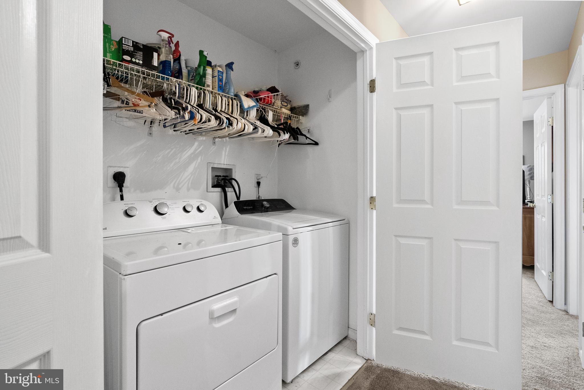 5 Chadwick Circle Eagleville, PA 19403 - Photo 22 of 32 a view of a storage & utility room with dryer washer and a view of kitchen