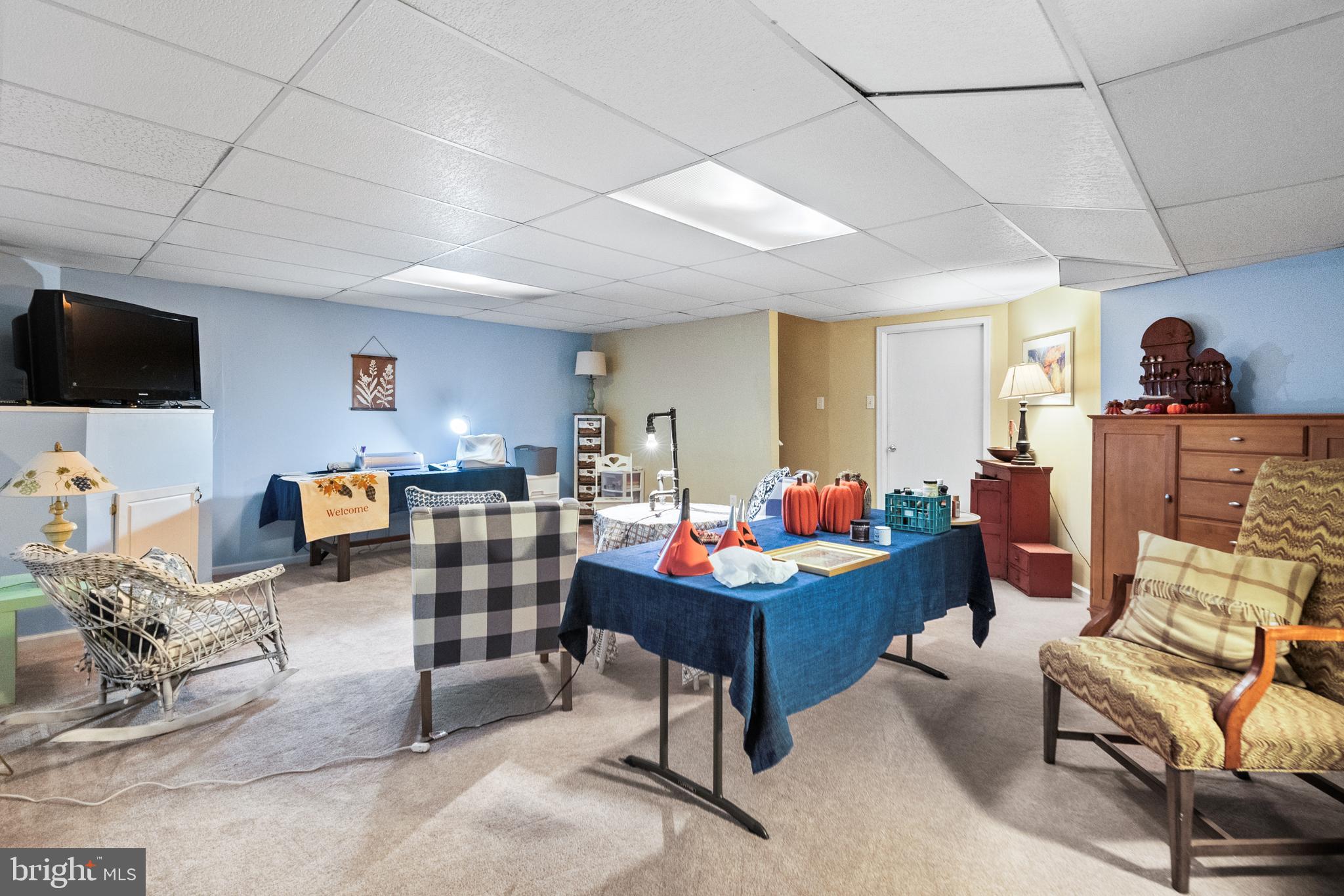 5 Chadwick Circle Eagleville, PA 19403 - Photo 24 of 32 a living room with furniture and a flat screen tv