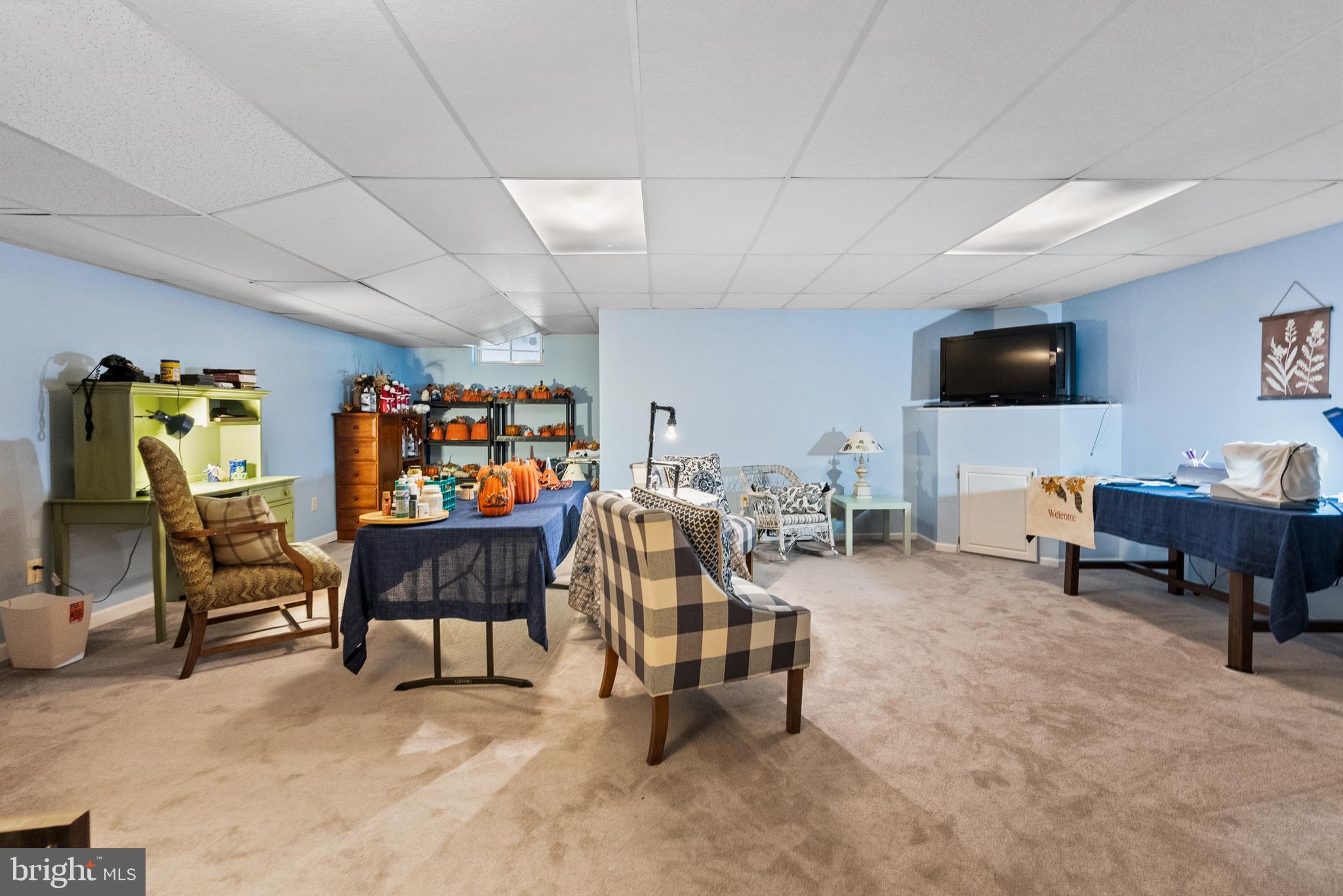 5 Chadwick Circle Eagleville, PA 19403 - Photo 25 of 32 a living room with furniture and a flat screen tv