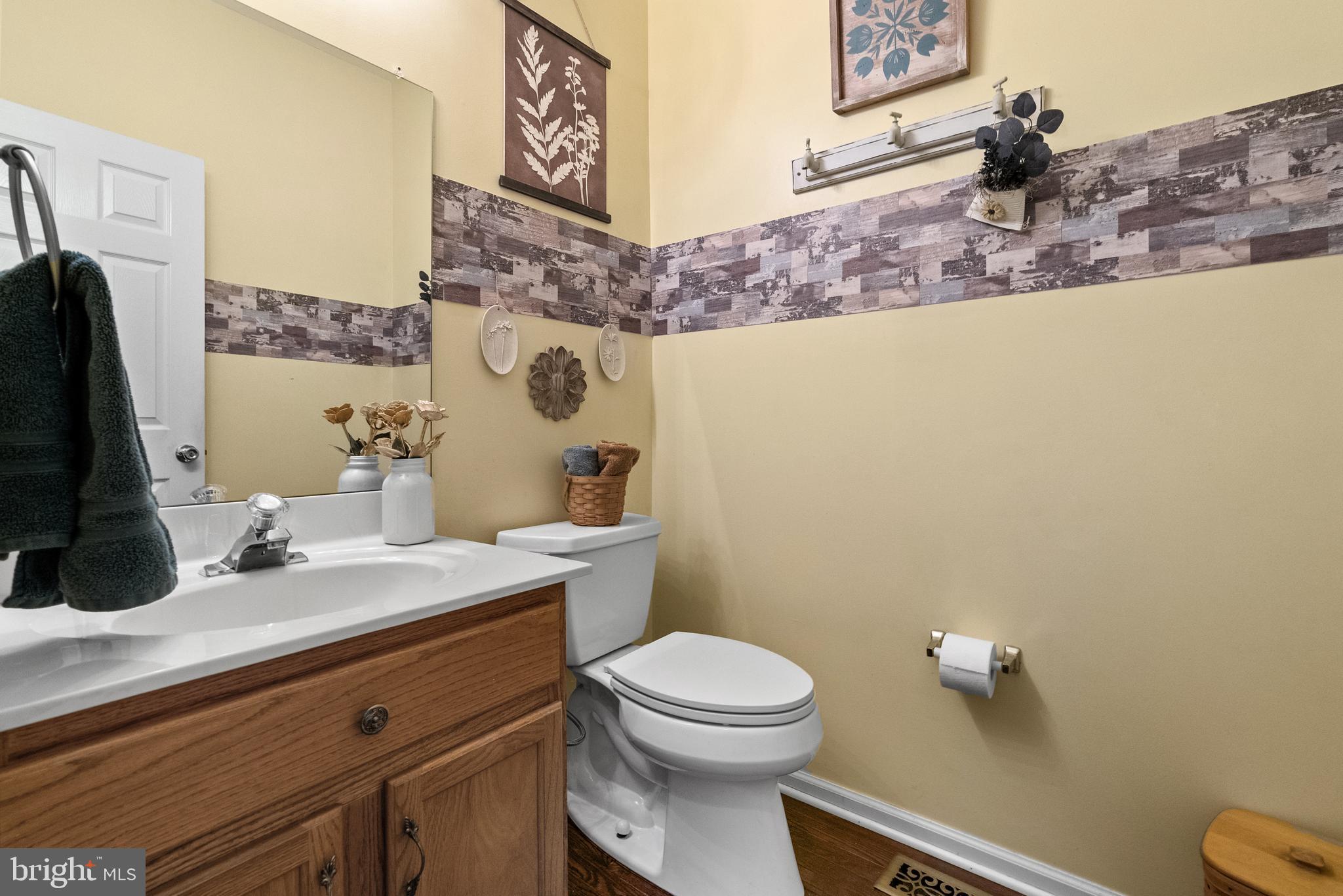5 Chadwick Circle Eagleville, PA 19403 - Photo 10 of 32 a bathroom with a sink a toilet and a mirror