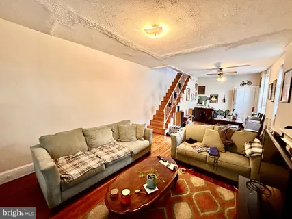 a living room with furniture and a couch