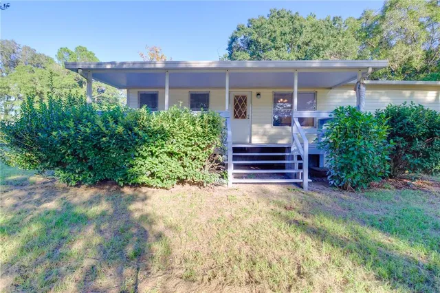 a view of a deck with wooden floor and outdoor space